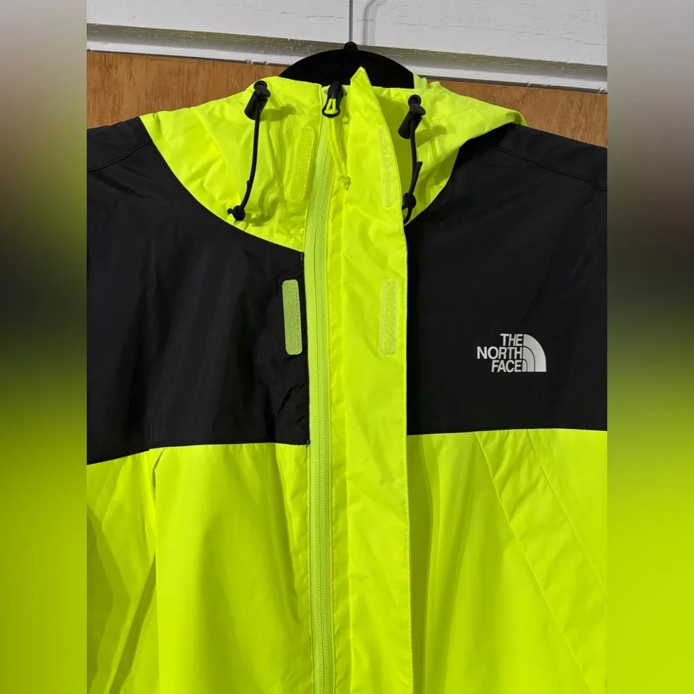 The North Face Neon Yellow and Black Windbreaker Coat